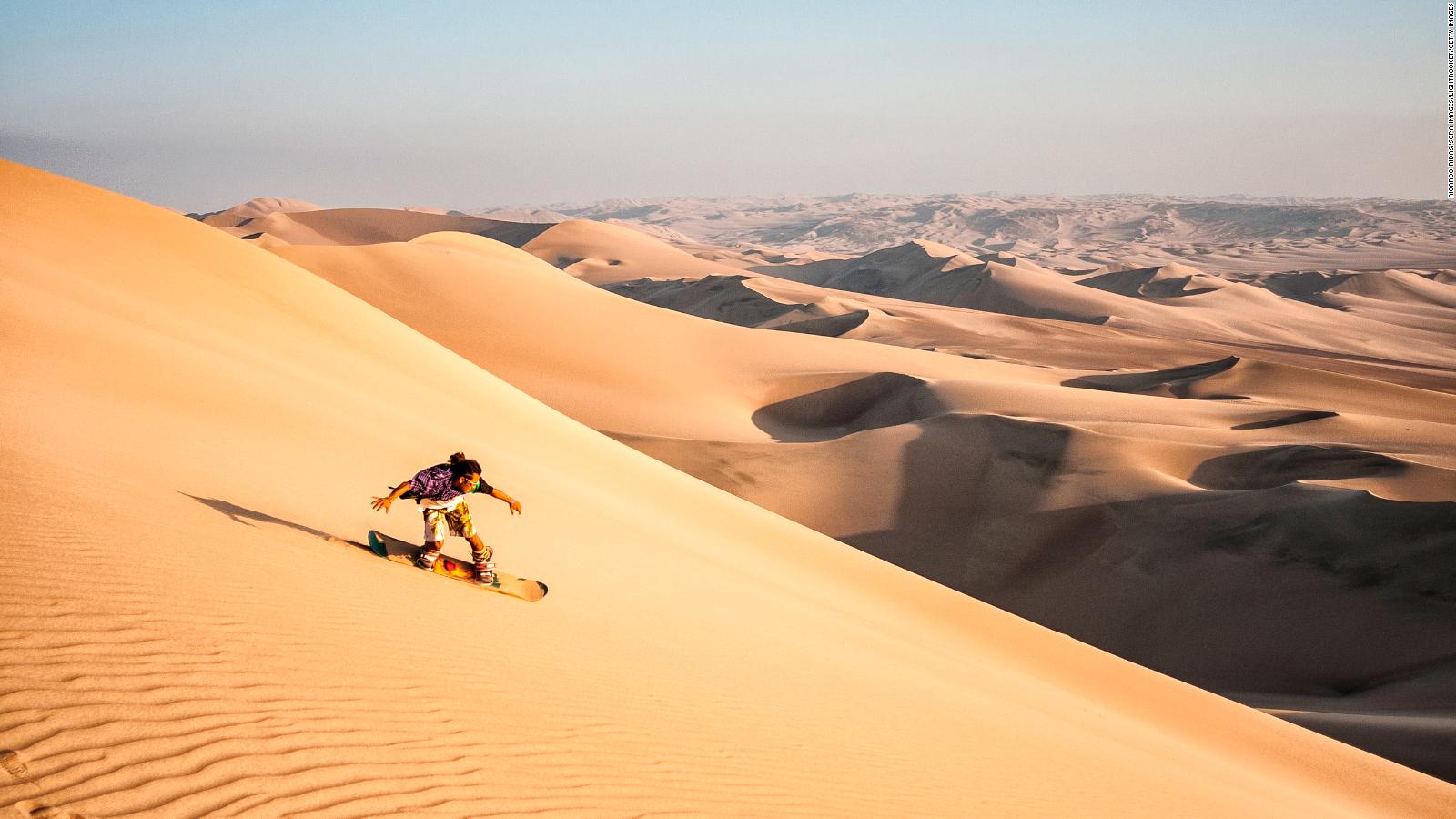 Sandboarding in the Sahara Desert